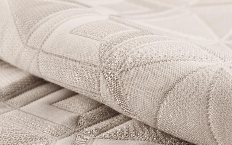 beige soft knitted mattress fabric with geometric motif